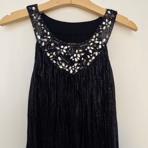 Navy blue knee length dress with silver detail, sleeveless, with beading details